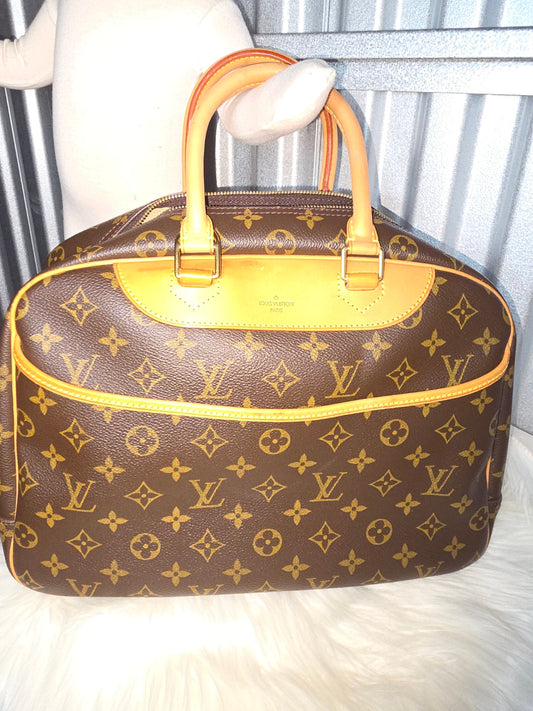 Full front view of monogram Deauville-style handbag