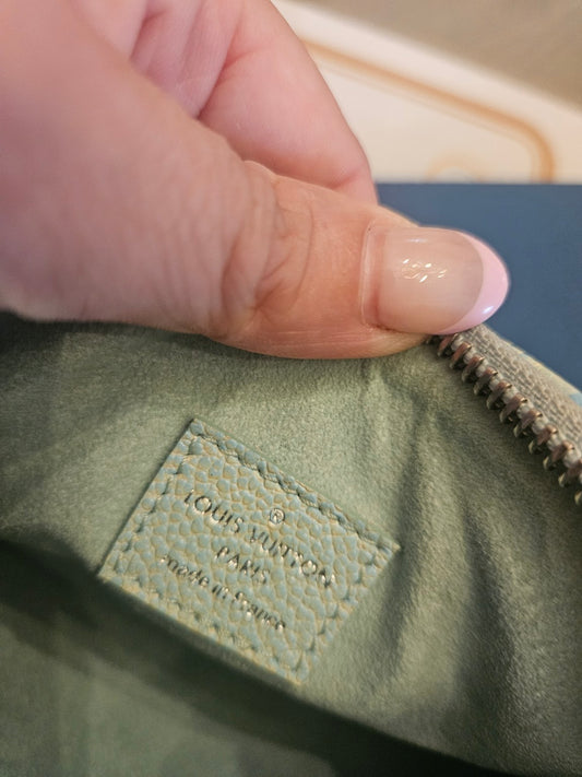 Actual Louis Vuitton mini handbag, detail photo
