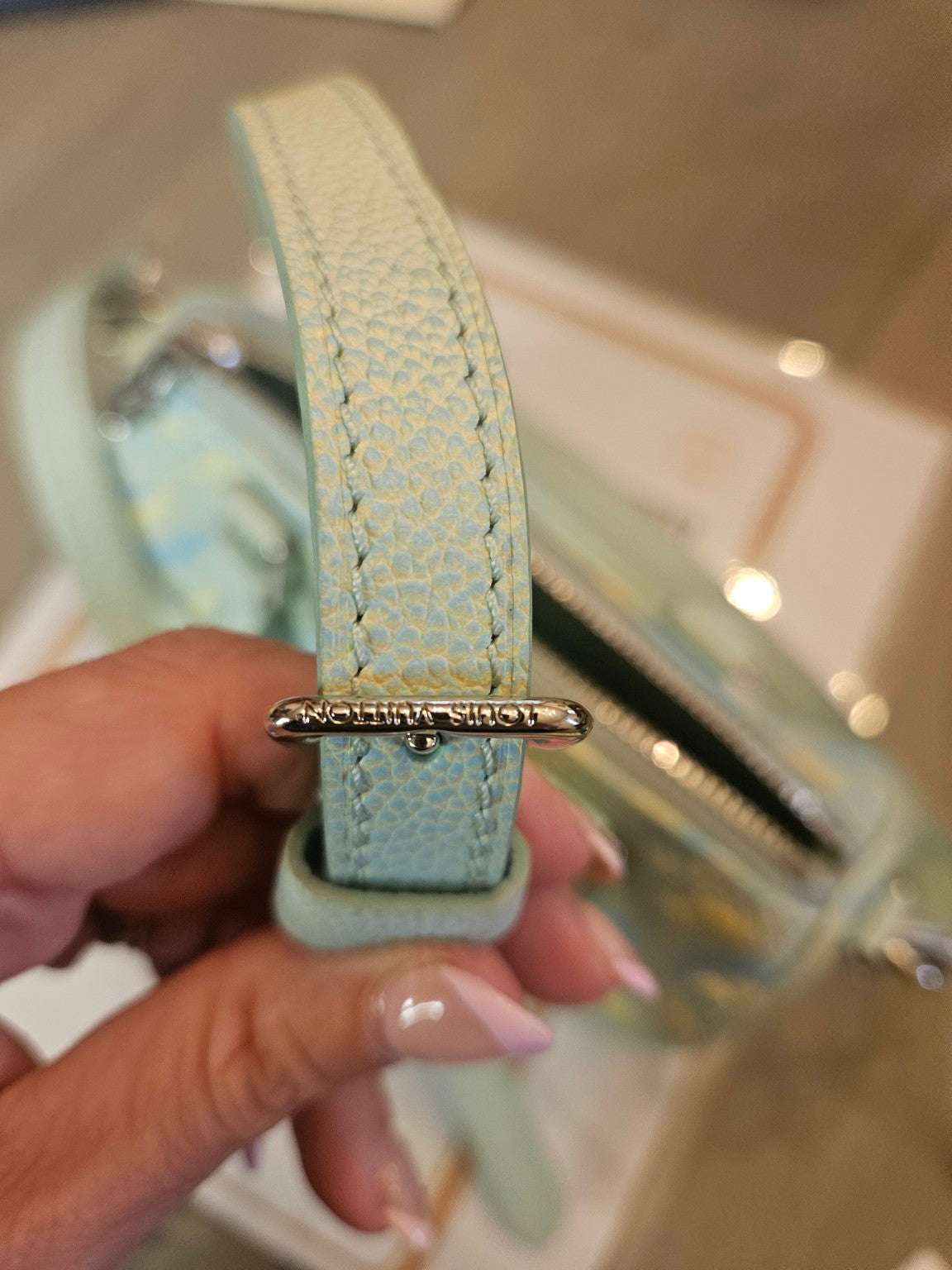 Actual Louis Vuitton mini handbag, detail photo