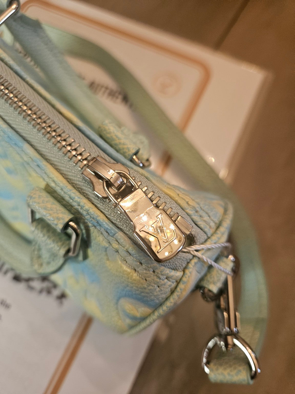 Actual Louis Vuitton mini handbag, detail photo