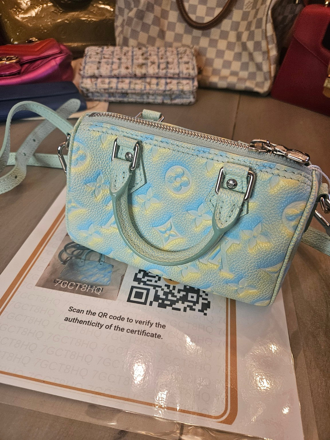 Actual Louis Vuitton mini handbag, detail photo